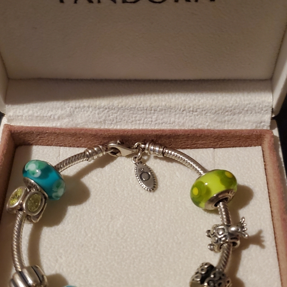 Pandora silver bracelet already to wear with charms on it.